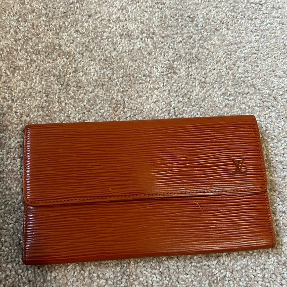 Louis Vuitton Handbags - Louis Vuitton Epi Porte Tresor International Leather Trifold Long Wallet